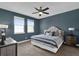 Inviting bedroom with neutral decor, plush carpeting, and ample natural light at 394 Captiva Dr, Davenport, FL 33896