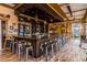 The community bar has stylish seating and decor, ideal for socializing and enjoying refreshments at 394 Captiva Dr, Davenport, FL 33896
