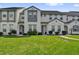 Charming townhome with well-maintained lawn and neutral-colored exterior at 394 Captiva Dr, Davenport, FL 33896