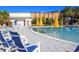 Enjoy the community pool with many chairs surrounding for a relaxing and luxurious vibe at 394 Captiva Dr, Davenport, FL 33896