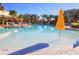 Enjoy the large community pool with many chairs surrounding for a relaxing and luxurious vibe at 394 Captiva Dr, Davenport, FL 33896