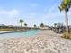 Community pool with ample seating and a spacious deck area, perfect for residents to enjoy sunny days at 4969 Kaia Ave, Winter Haven, FL 33884