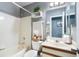 Well-appointed bathroom with a shower-tub combination, modern vanity, and stylish decor at 5273 Tunbridge Wells Ln # 1601, Orlando, FL 32812