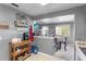 Open-concept dining area leading to the kitchen and living room, ideal for modern living at 5273 Tunbridge Wells Ln # 1601, Orlando, FL 32812