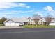 Well-maintained townhome with a tidy front lawn, private garages, and lovely curb appeal at 5273 Tunbridge Wells Ln # 1601, Orlando, FL 32812