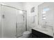 This bathroom features a shower with glass door and a vanity with modern fixtures, offering both style and functionality at 612 Via Isabelle Dr, Debary, FL 32713