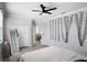 This bedroom offers ample closet space and features stylish decor, creating a relaxing retreat at 612 Via Isabelle Dr, Debary, FL 32713