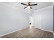 This bedroom features neutral walls and a ceiling fan, ready for personalization and comfort at 612 Via Isabelle Dr, Debary, FL 32713