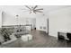 Loft area featuring plank flooring, seating, and a view of downstairs, perfect for a cozy and inviting space at 612 Via Isabelle Dr, Debary, FL 32713
