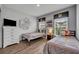 Charming bedroom with two twin beds, wood-look floors, and Harry Potter themed decor at 638 Ogelthorpe Dr, Davenport, FL 33897