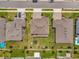 Aerial view of the property highlighting the spacious backyard with play area at 760 Annabell Ridge Rd, Minneola, FL 34715