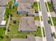 Aerial view of the property highlighting the spacious backyard with play area at 760 Annabell Ridge Rd, Minneola, FL 34715