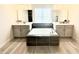 Luxurious bathroom with a soaking tub, dual vanities, and modern fixtures at 760 Annabell Ridge Rd, Minneola, FL 34715