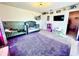 Bedroom features two toddler beds and a lilac carpet at 760 Annabell Ridge Rd, Minneola, FL 34715