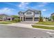 Charming two-story home with stone accents and three-car garage at 760 Annabell Ridge Rd, Minneola, FL 34715