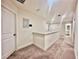 Upstairs hallway featuring carpet, a railing, and access to the bedrooms at 760 Annabell Ridge Rd, Minneola, FL 34715