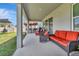 Covered patio offers comfortable seating and an outdoor bar area at 760 Annabell Ridge Rd, Minneola, FL 34715