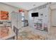 Playroom featuring a large TV, toy storage, and craft area that inspires learning and creativity at 760 Annabell Ridge Rd, Minneola, FL 34715