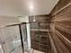 Modern shower featuring beautiful tile work and sleek fixtures at 760 Annabell Ridge Rd, Minneola, FL 34715