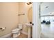 This powder room features a pedestal sink, oval mirror, and is conveniently located near the living area at 7824 Loxahatchee Ct, Reunion, FL 34747