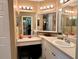 Well-lit bathroom vanity features ample storage and a stylish design at 8830 Coral Palms Ct # A, Kissimmee, FL 34747