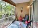 Relaxing screened patio, with seating, providing an outdoor living space at 8830 Coral Palms Ct # A, Kissimmee, FL 34747