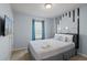Calming bedroom with soft natural light from window and decor art at 926 Paradise Dr, Davenport, FL 33897