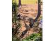 A peaceful backyard featuring trees and a bird bath at 9346 San Jose Blvd, Howey In The Hills, FL 34737