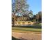 Stunning view of the golf course featuring water features and manicured greenery at 9346 San Jose Blvd, Howey In The Hills, FL 34737