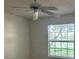Bedroom features carpet, ceiling fan and window with pond view at 1013 S Hiawassee Rd # 3626, Orlando, FL 32835