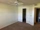 Bedroom featuring a ceiling fan, closet, and bathroom at 1013 S Hiawassee Rd # 3626, Orlando, FL 32835