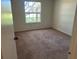 Cozy bedroom with wall to wall carpet and natural light at 1013 S Hiawassee Rd # 3626, Orlando, FL 32835