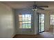 Bedroom features carpet, ceiling fan and window at 1013 S Hiawassee Rd # 3626, Orlando, FL 32835