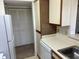 Kitchen with white cabinets, stainless steel sink and appliances at 1013 S Hiawassee Rd # 3626, Orlando, FL 32835