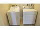 Laundry room with side-by-side washer and dryer units at 1083 S Hiawassee Rd # 635, Orlando, FL 32835