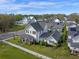 Expansive aerial view of a two-story home with a covered porch in a green neighborhood at 1091 Eaglecrest Dr, Winter Garden, FL 34787