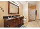 Bathroom with double sink vanity and access to the backyard at 1232 Scandia Ter, Oviedo, FL 32765