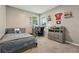 Bedroom with desk and grey wood furnishings at 1232 Scandia Ter, Oviedo, FL 32765