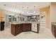 Open concept kitchen with granite counters overlooking the living area at 1232 Scandia Ter, Oviedo, FL 32765