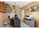 Inviting home office featuring custom baseball display, neutral colors, and ample workspace at 1232 Scandia Ter, Oviedo, FL 32765