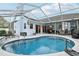 Refreshing pool with screened enclosure, patio, and outdoor entertaining area at 1232 Scandia Ter, Oviedo, FL 32765