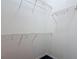 Empty walk-in closet featuring open wire shelving for organization and storage at 124 Meridian Ave, Kissimmee, FL 34759
