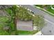 An aerial view of this well-maintained property showcases the home's layout, landscaping, and surrounding neighborhood at 13440 Fordwell Dr, Orlando, FL 32828