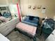 Bedroom with tile floors, a window for natural light, and neutral paint at 13440 Fordwell Dr, Orlando, FL 32828
