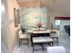 Dining area with modern lighting and a view into other living spaces at 13440 Fordwell Dr, Orlando, FL 32828