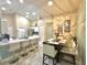 Kitchen open to dining room, featuring quartz countertops and tile floors at 13440 Fordwell Dr, Orlando, FL 32828