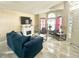 Bright living room featuring tile floors, a fireplace, and lots of natural light at 13440 Fordwell Dr, Orlando, FL 32828