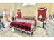 Stylized main bedroom with a king bed, decorative pillows and matching night stands with lamps at 13440 Fordwell Dr, Orlando, FL 32828