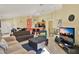 Spacious living area featuring tile flooring, neutral paint, and an open layout perfect for entertaining at 151 Castaway Beach Way, Kissimmee, FL 34746