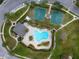 Aerial view of the community pool and basketball courts at 1552 Broken Oak Dr # B, Winter Garden, FL 34787